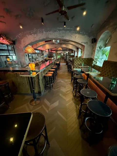 Back bar, looking along the seating areas and bar counter